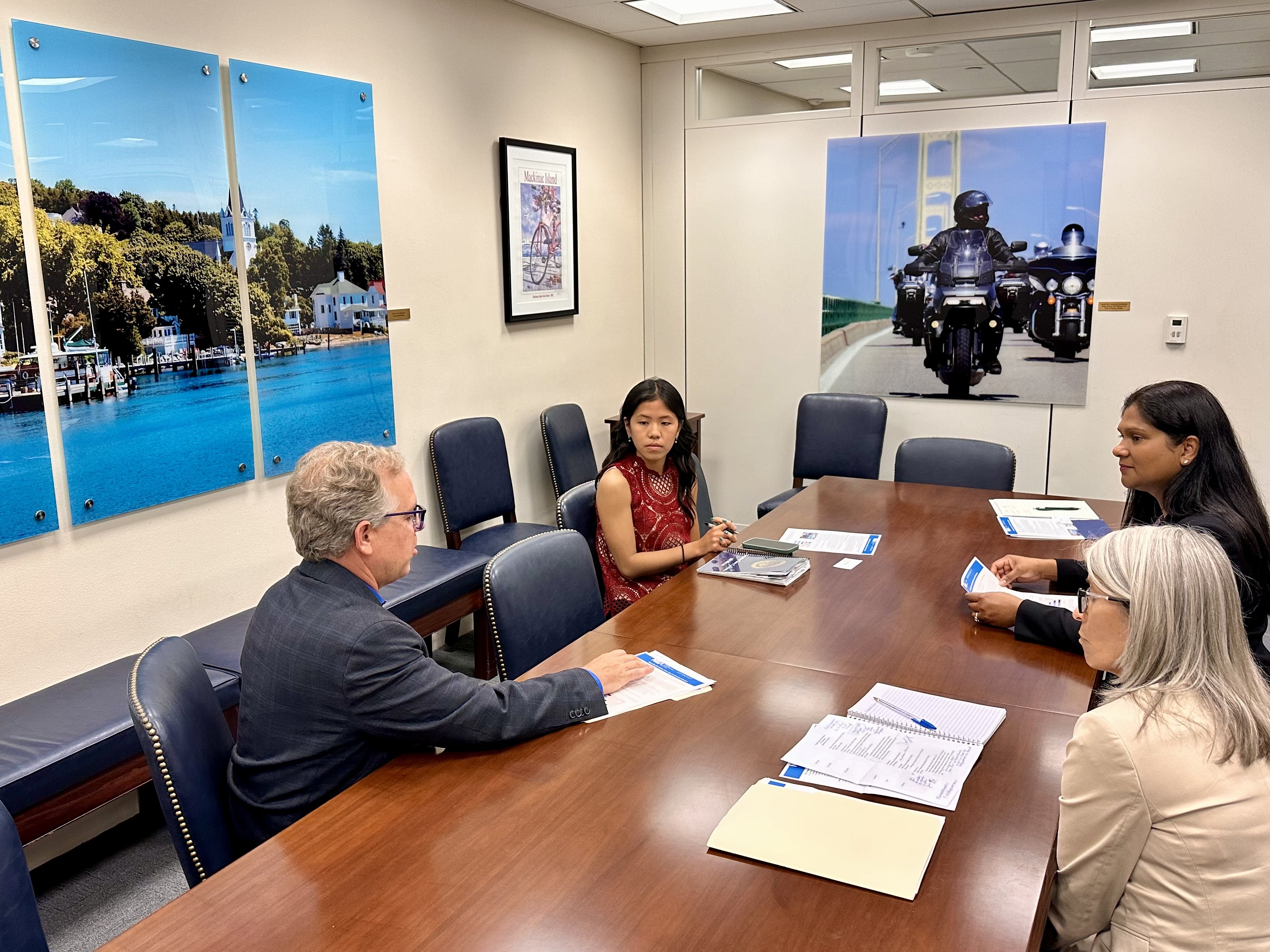 NGA's Tom Culp and Urmilla Sowell, and Laurie Purpuro, government affairs advisor, K&L Gates, meet with Isabelle Zhan from the office of Senator Gary Peters (D-MI)