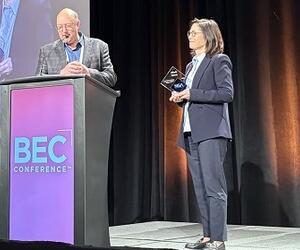 Rick Locke Presents NGA's First Business Leadership Award to Nicole Harris During BEC Conference